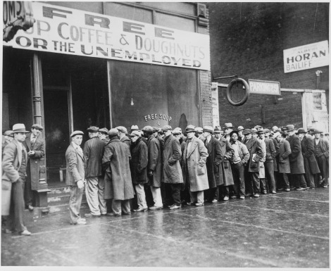 Unemployed_men_queued_outside_a_depression_soup_kitchen_opened_in_Chicago_by_Al_Capone,_02-1931_-_NARA_-_541927_0